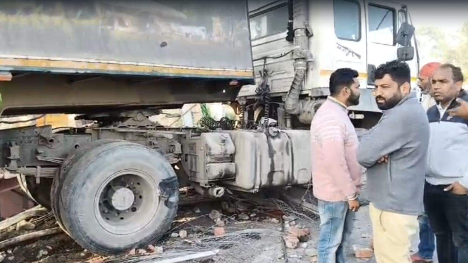 A trolley broke the railing on the highway in Jalandhar and was suspended in the air